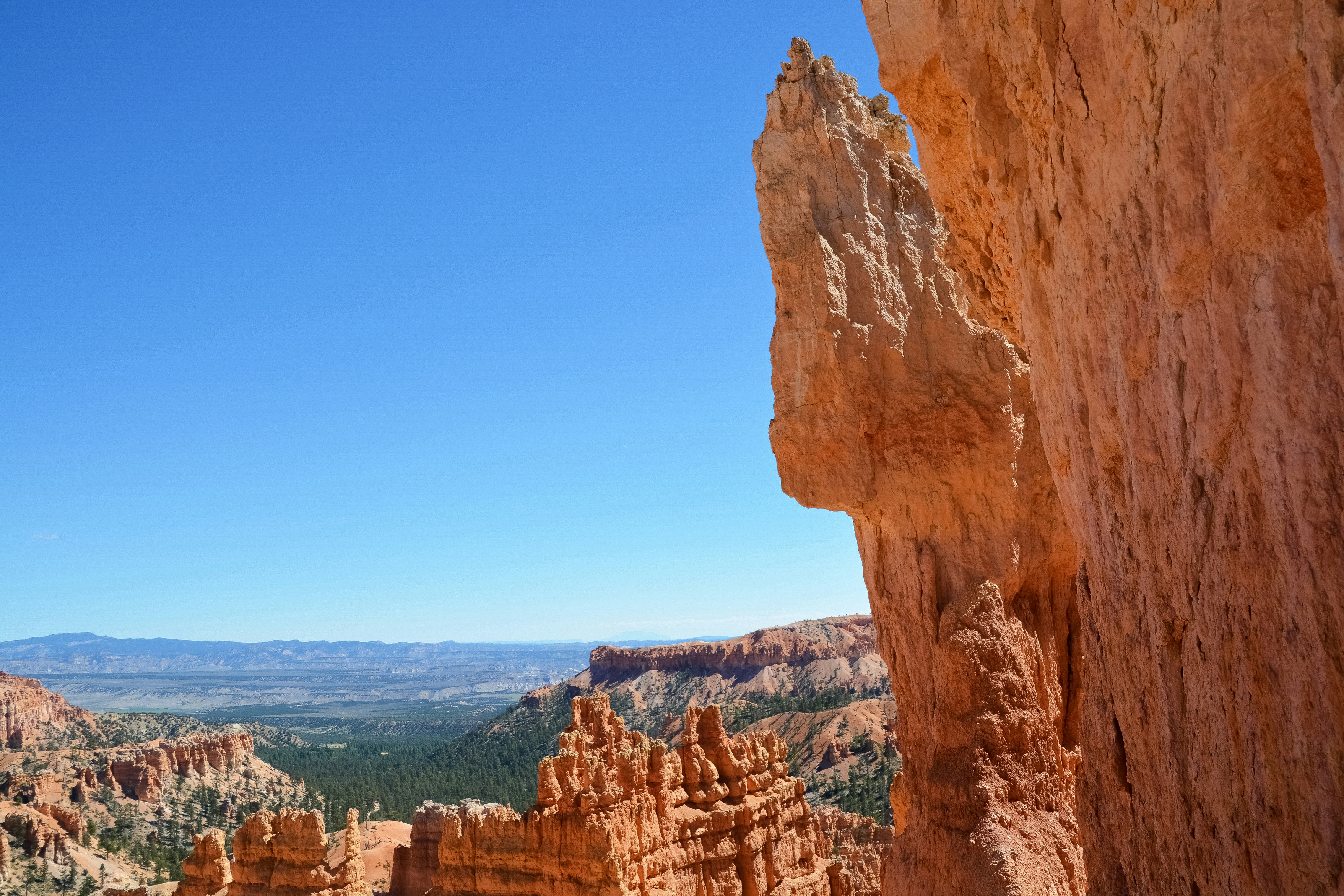 brown rock formation under blue sky during daytime